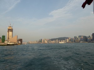 a view of Victoria Harbour, with HK Island on the right and Kowloon (mainland) on the left; the City has reclaimed a lot of land and the harbor is smaller than it used to be. 