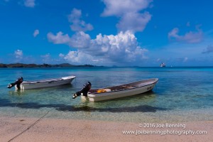 Boats anchored in the shallow water of the beach,Yasawa-i-Rara, Fiji