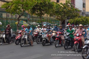 Saigon's streets are crammed with people riding motorbikes.