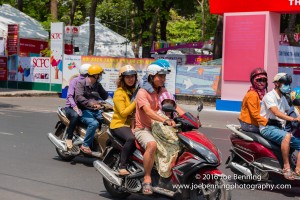 Motorbikes whiz along the streets of Saigon