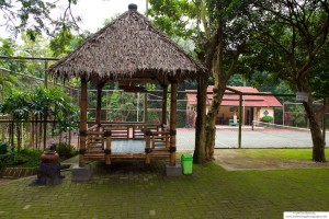 Tennis Court and Observation Area under a Thatched Roof in Java