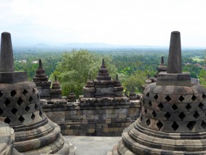 a view out from among the stupa near the top of Borobudur