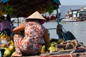 Vietnamese Woman with Fruits and Vegetables on Board a Junk on the Mekong River