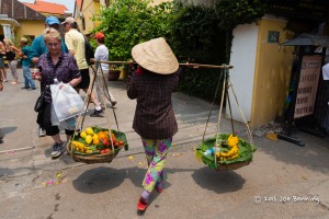 Woman Carries Produce to Market in Hoi An