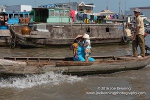 Woman with Baby in Vietnamese Junk on Mekong River