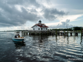 Boat Steers Past Roanoke Marshes Lighthouse