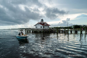Boat Steers Past Roanoke Marshes Lighthouse