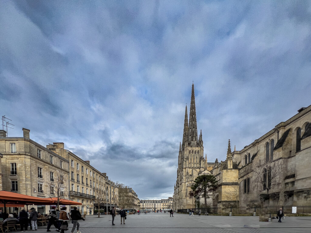 The soaring spires of Bordeaux Cathedral in the town square